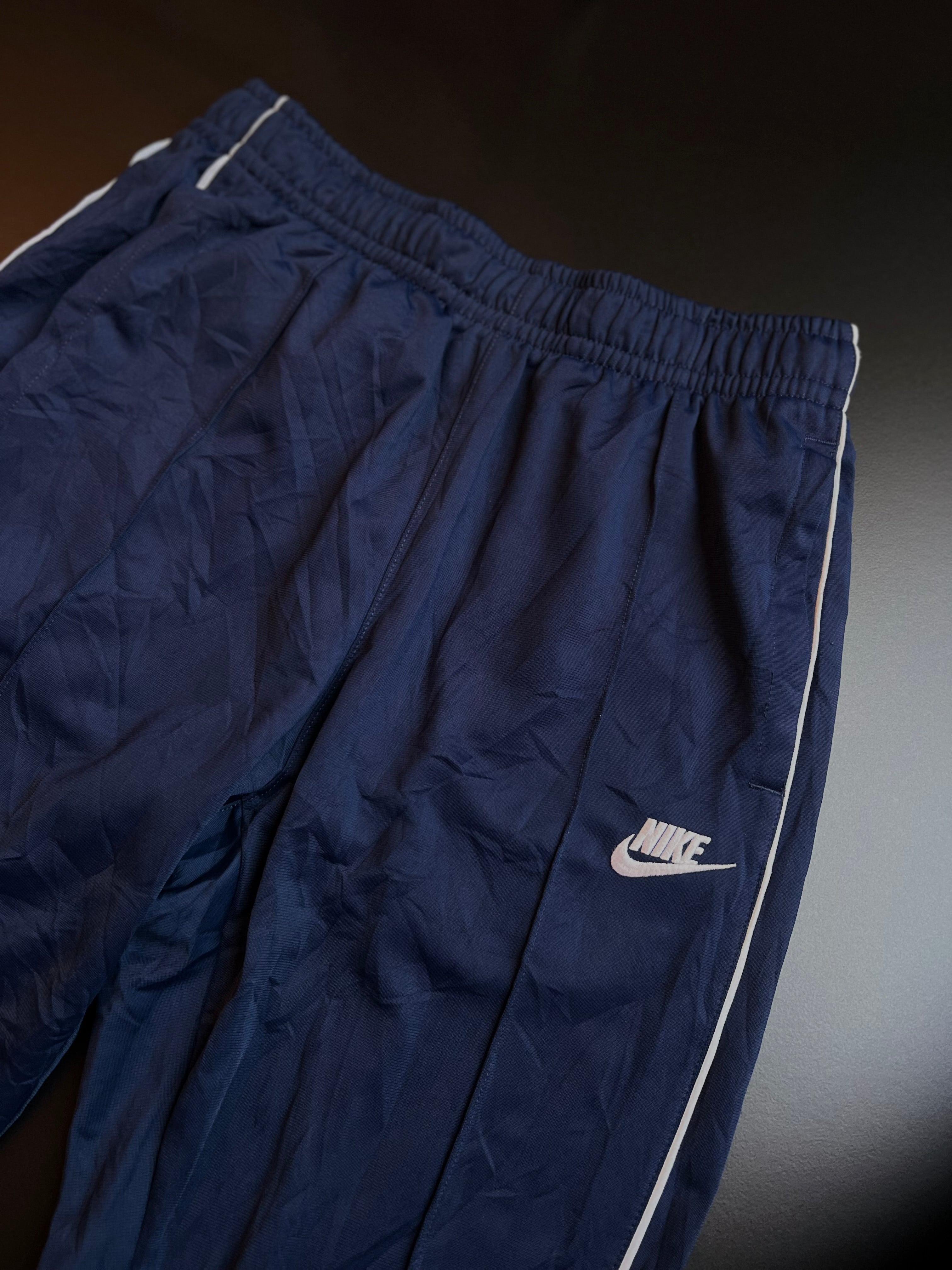 Nike Track Trousers | Navy | White Swoosh Side Stripe | S