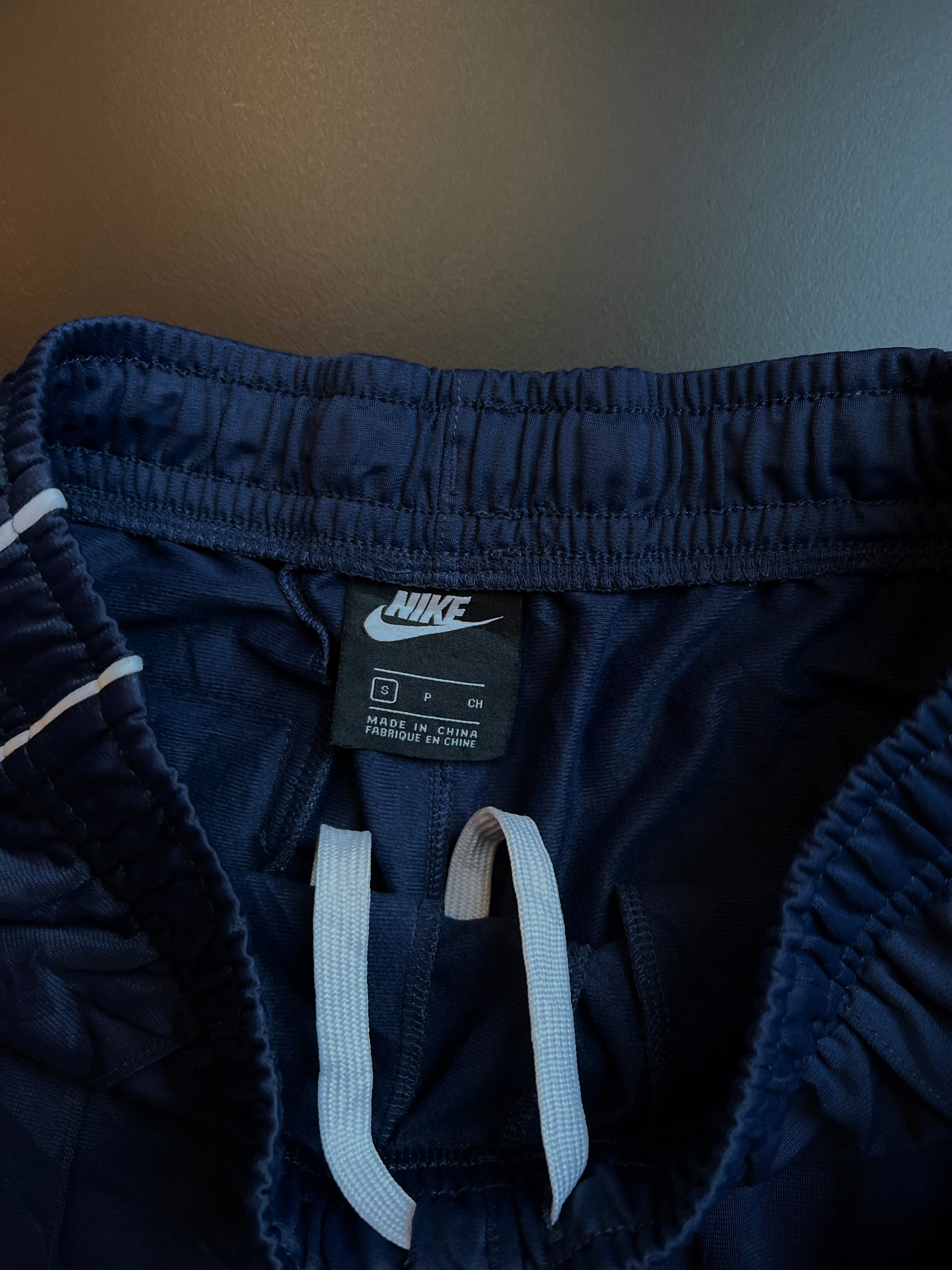 Nike Track Trousers | Navy | White Swoosh Side Stripe | S