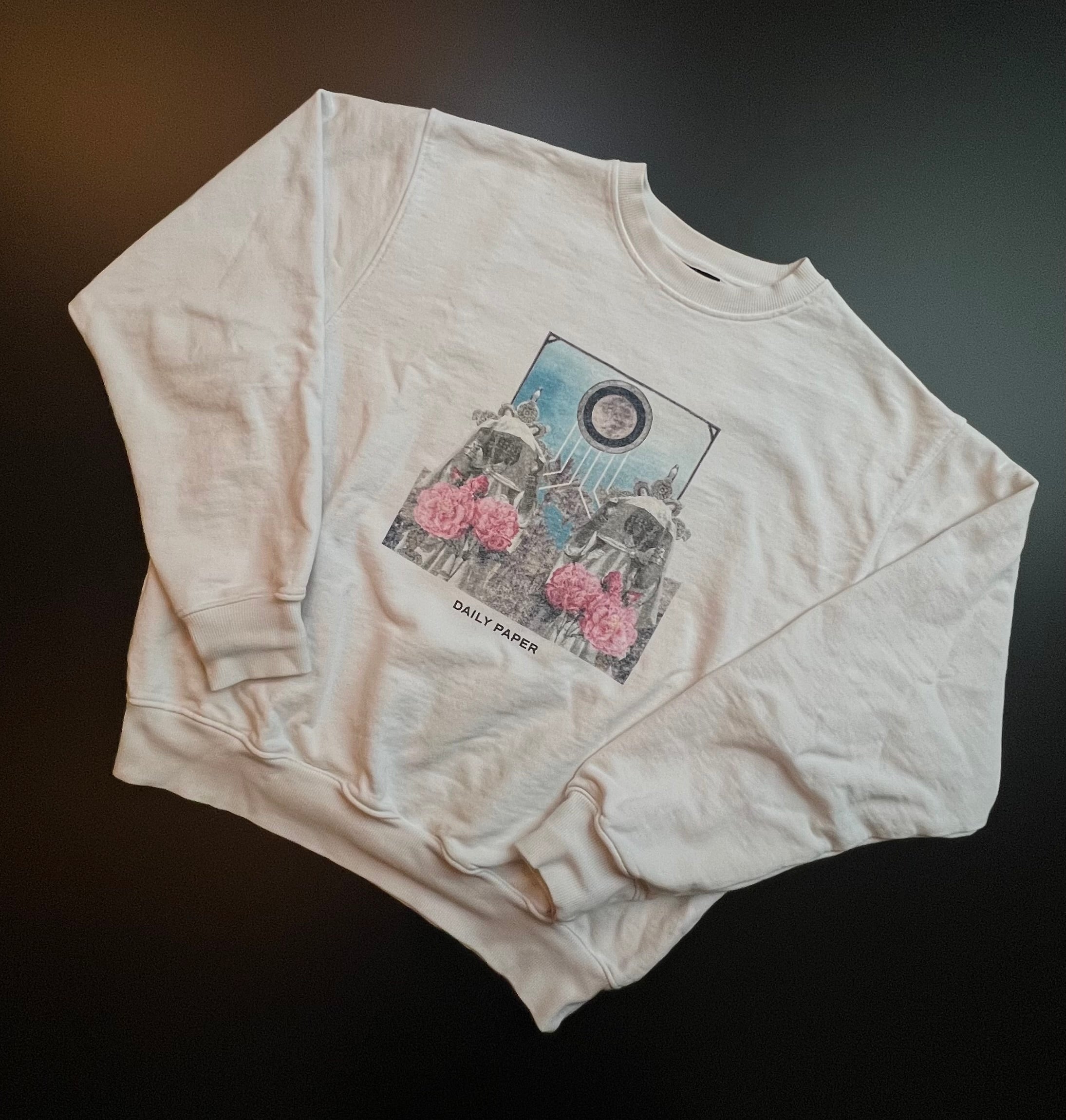 Cream white Daily Paper sweater with graphic print, featuring a relaxed fit and made in Portugal.