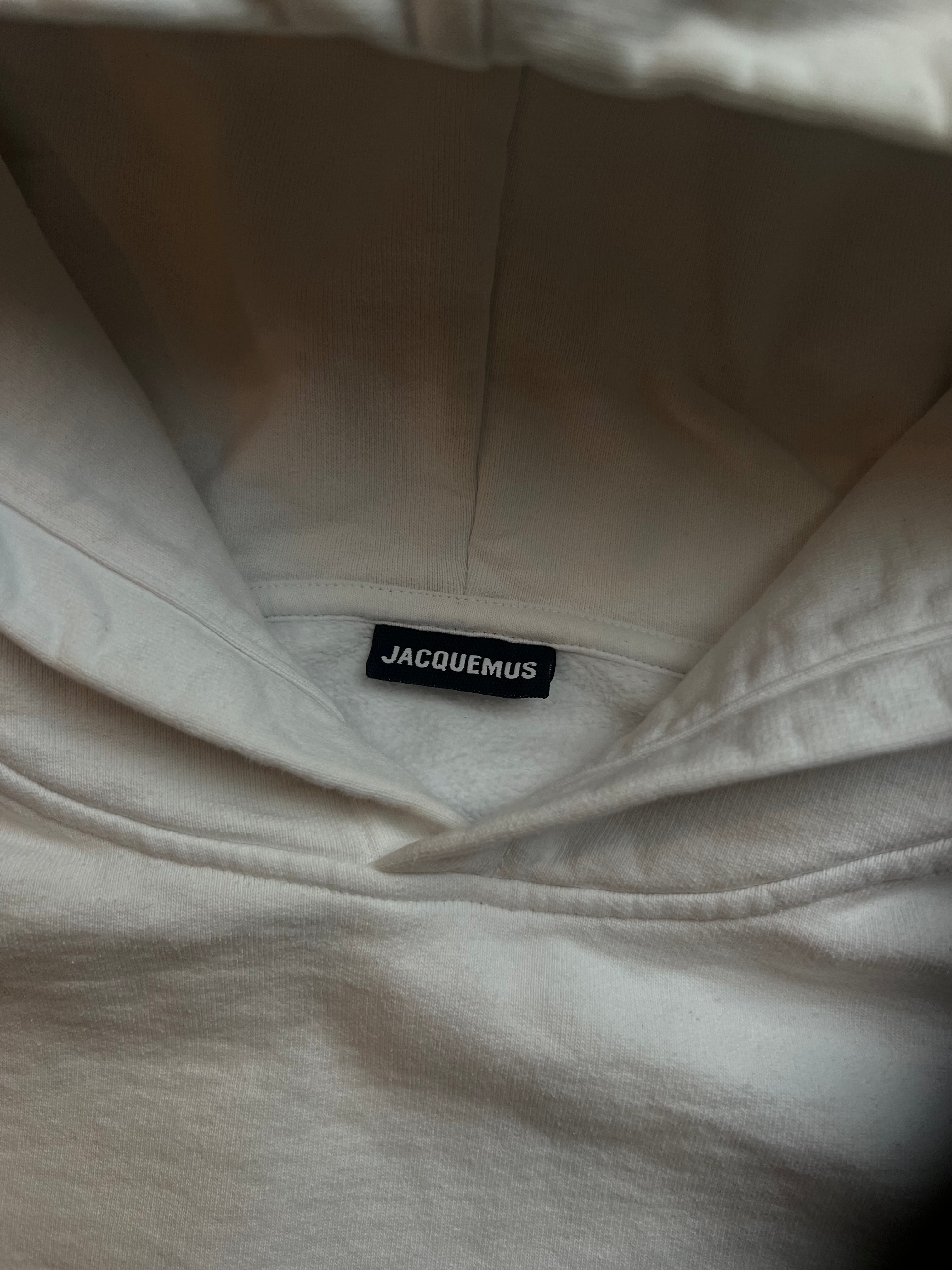 Cream white Jacquemus hoodie in size M, featuring a relaxed fit and minimalistic design.