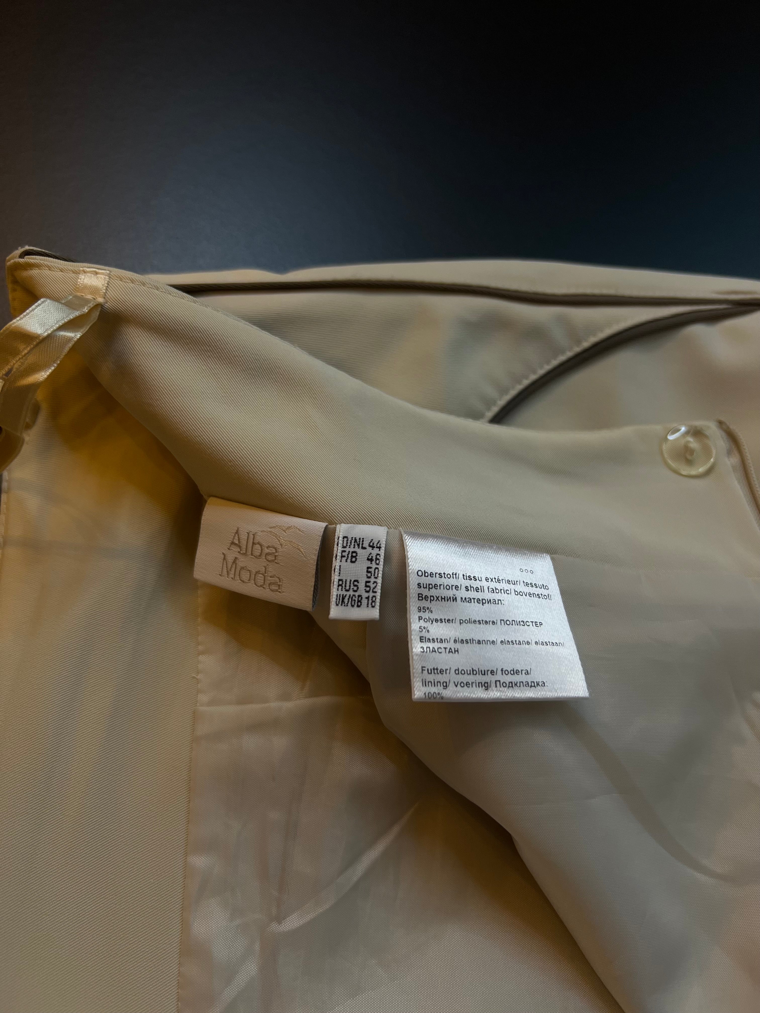 Beige Alba Moda skirt in size 44, featuring a classic design from KM Timeless Vintage, showcased on a hanger.