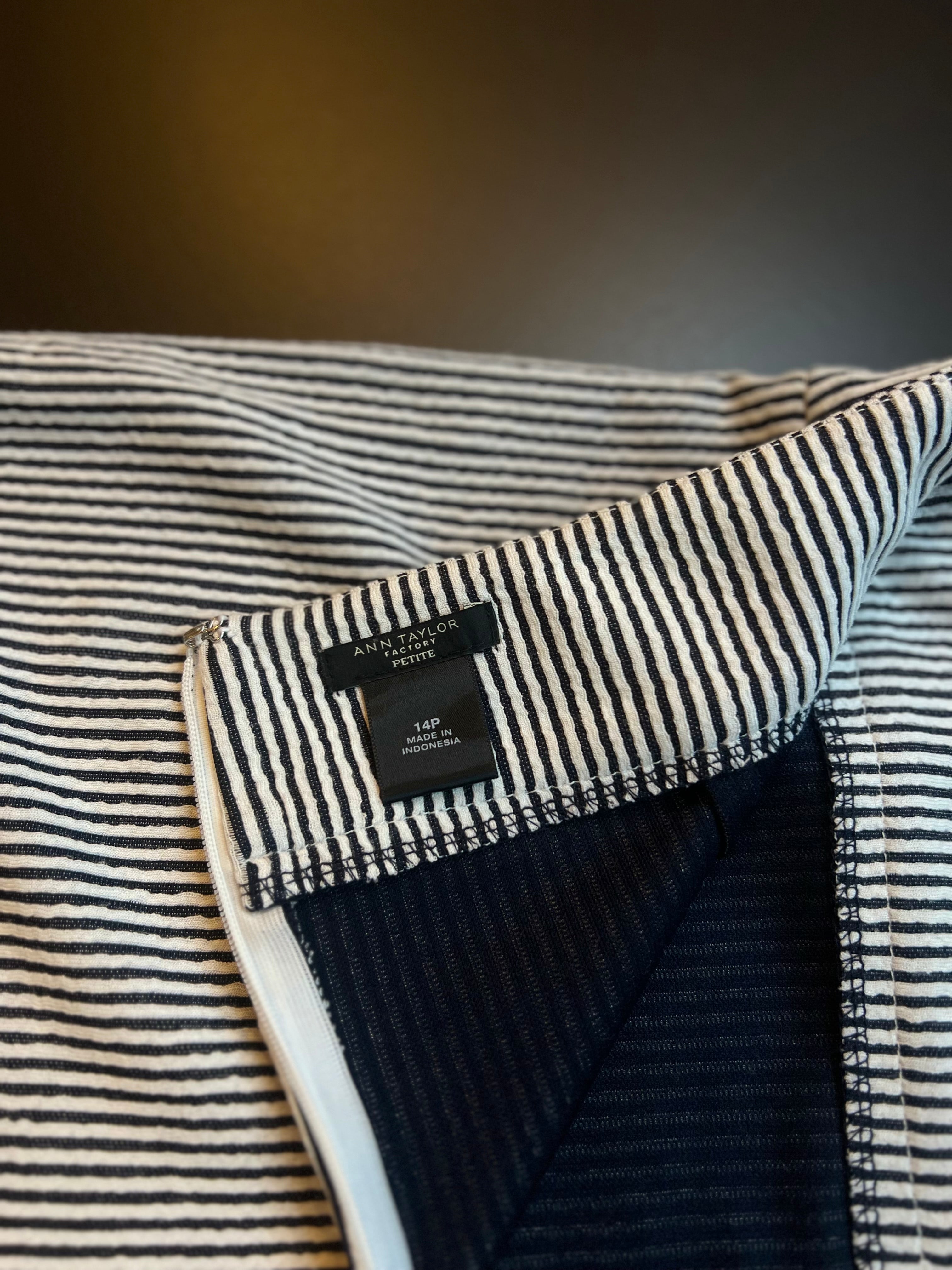 Black and white striped Ann Taylor Factory skirt in size 14P, featuring a classic design and lightweight fabric.